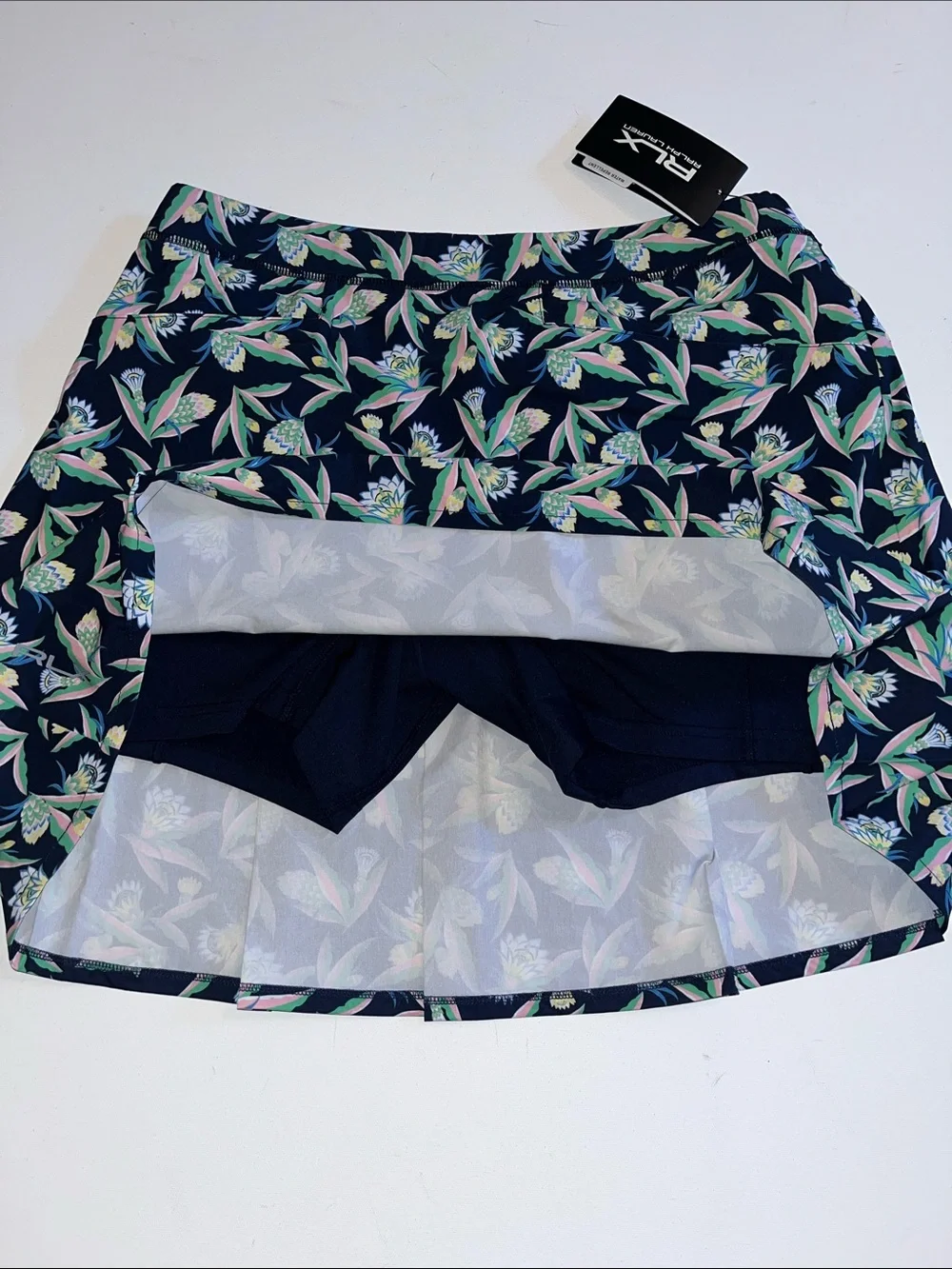 RLX Ralph Lauren Golf Skort Women's M blue pink Floral Pleated Stretch $148